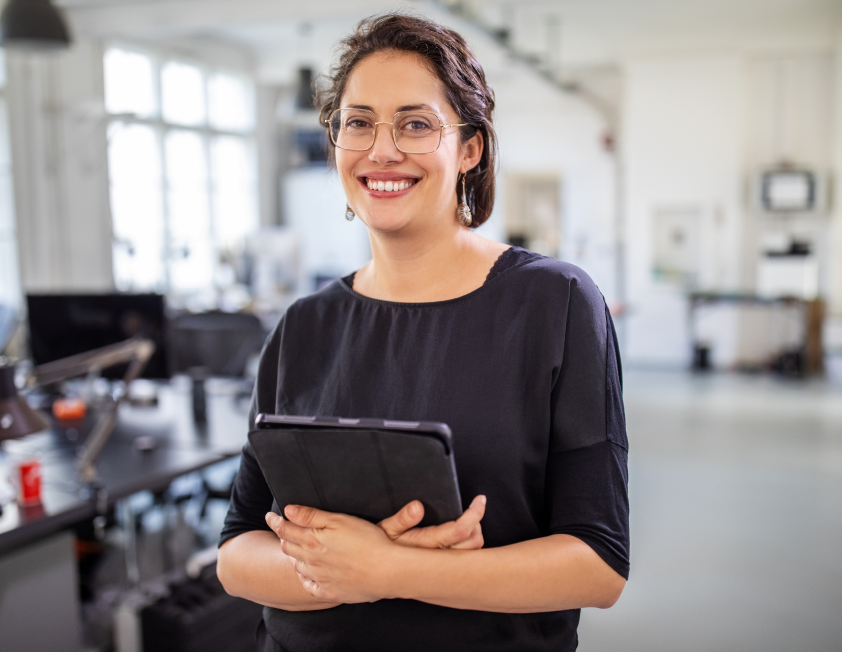 Woman with ipad smiling